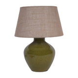 Libra Interiors Glazed Ceramic Hessian Table Lamp in green with a rounded urn-shaped mossy glazed base and woven natural hessian shade, on a white background.