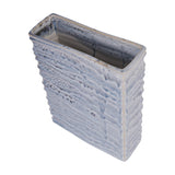 Libra Interiors Rippled Ceramic Rectangular Vase in blue reactive glaze with grey and white tones, shown at an angled top view on a white background.