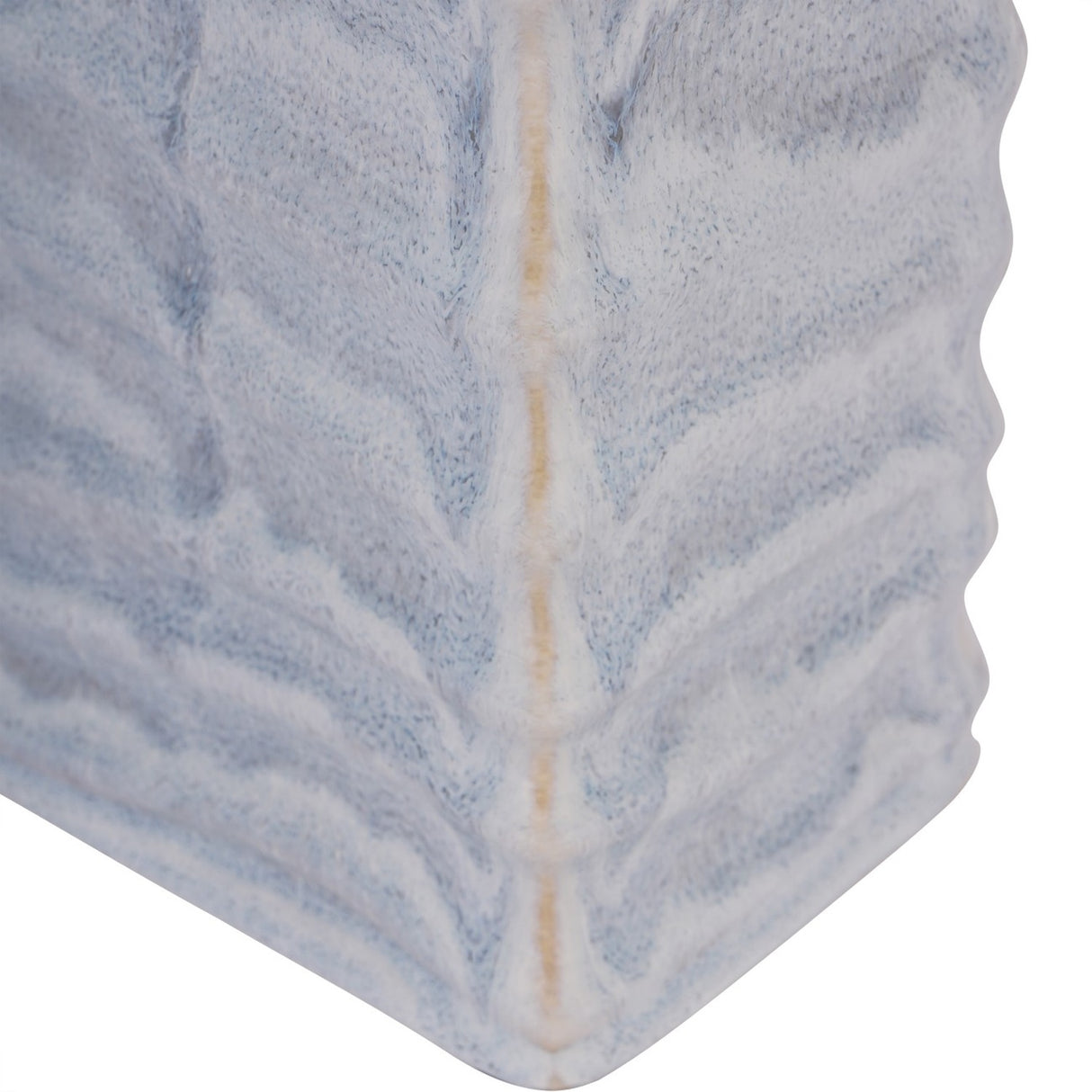 Close-up of the Libra Interiors Rippled Ceramic Rectangular Vase in blue, showing the corner ridge and reactive blue, grey and white glaze.