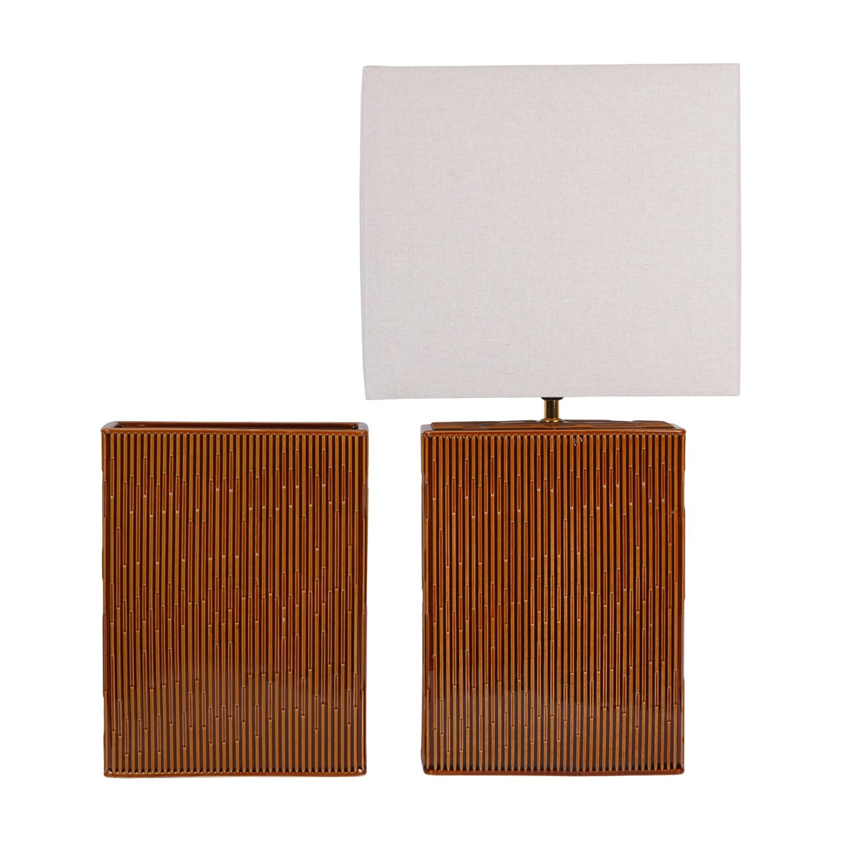 Libra Interiors ribbed ceramic vase in terracotta brown glaze shown beside a matching rectangular table lamp with cream shade on a white background.