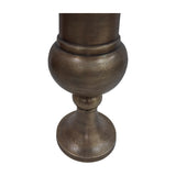 Close-up of the Libra Interiors Trumpet Antique Brass Floor Vase base, showing the rounded urn body, turned ball detail and pedestal foot in brushed brass.