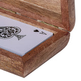 Close-up of the Libra Interiors Mango Wood Brass Inlay Card Game box open at the hinge, showing an Ace of Spades card resting inside the warm brown wood.