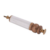 Libra Interiors Brass and Bone Inlay Candle Snuffer with white bone handle, turned mango wood detailing and antique brass fittings on a plain background.