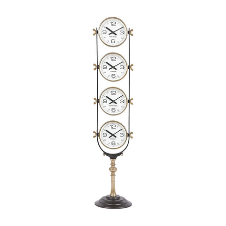 Libra Interiors Brushed Brass Four-Dial World City Floor Clock with vertically stacked New York, London, Hong Kong and Sydney dials on a pedestal base.