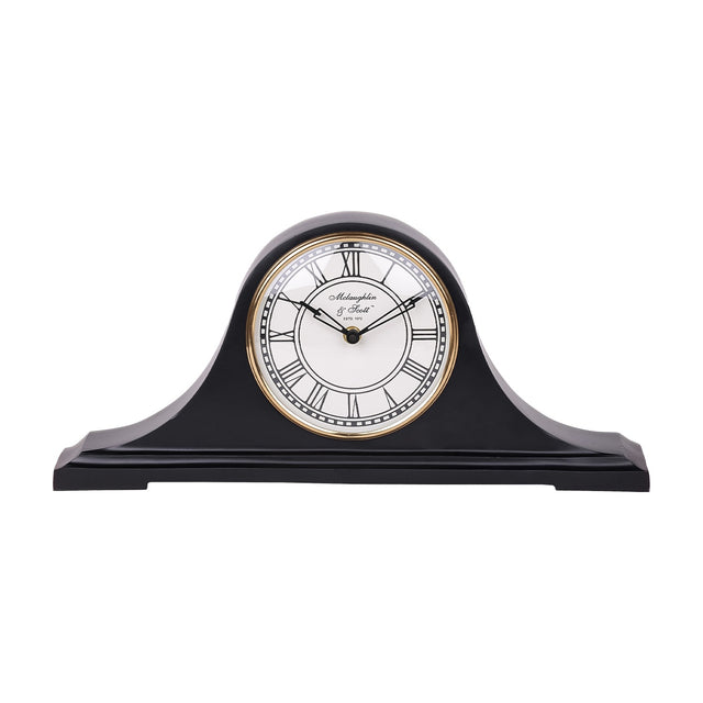Libra Interiors Matt Black Roman Numeral Mantel Clock with humped aluminium body, white Roman numeral dial and antique gold bezel on a white background.