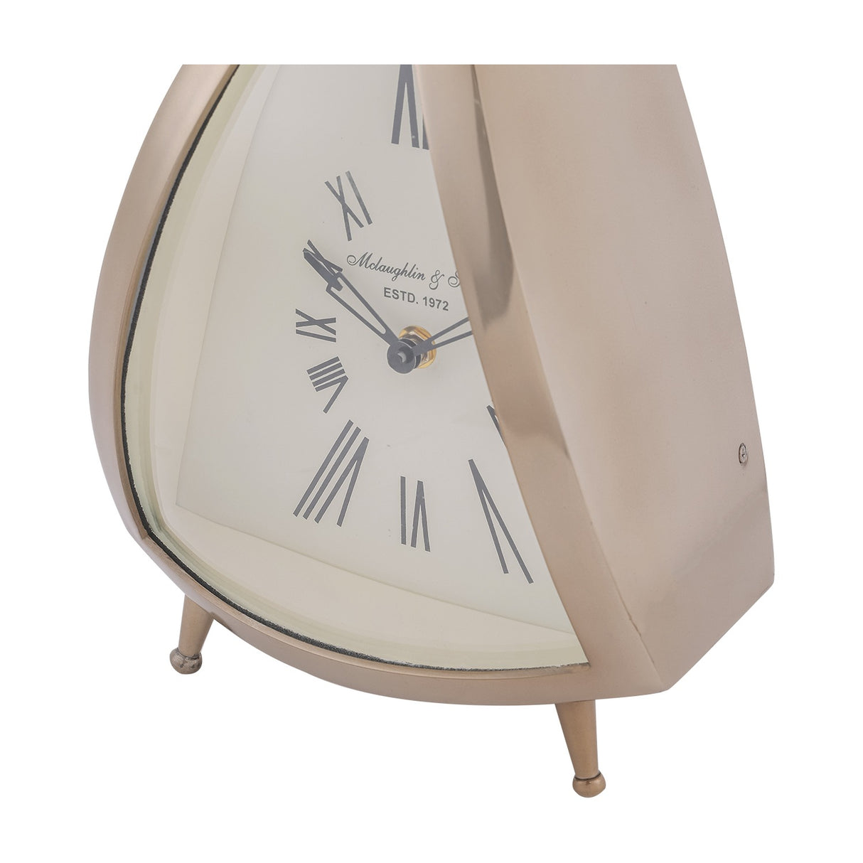 Close-up of the Libra Interiors Brushed Brass Curved Front Mantel Clock showing its cream Roman numeral dial, curved glass front and splayed feet.