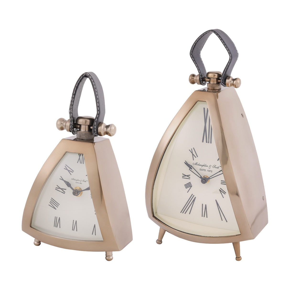Libra Interiors Brushed Brass Curved Front Mantel Clocks in two sizes with rounded triangular cases, white Roman numeral dials and stitched leather handles.