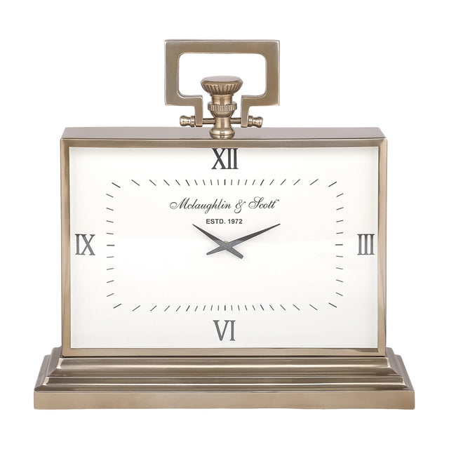Libra Interiors brushed brass rectangular mantel clock with white Roman numeral dial, looped handle, fluted knob and stepped plinth base on a white background.