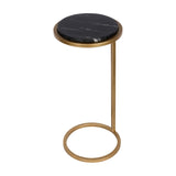 Libra Interiors round side table with black marble top and cantilevered aged gold iron frame on a looped base, shown on a white background.