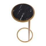 Libra Interiors Round Marble Aged Gold Side Table in black, top-down view showing the veined black marble top and looped iron base.
