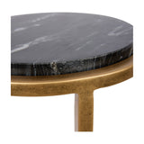 Close-up of the Libra Interiors Round Marble Aged Gold Side Table showing the black marble top with grey veining set within a smooth aged gold iron rim.