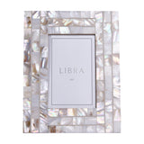 Libra Interiors mother of pearl mosaic photo frame in ivory, holding a 4x6in aperture within a shimmering hand-set shell tile border.