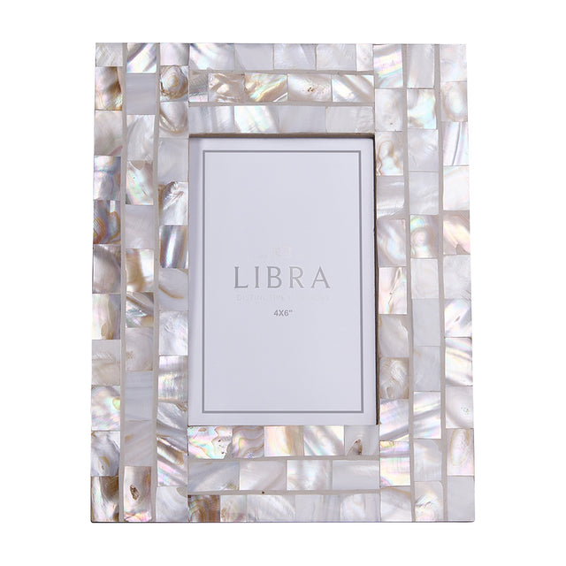 Libra Interiors mother of pearl mosaic photo frame in ivory, holding a 4x6in aperture within a shimmering hand-set shell tile border.