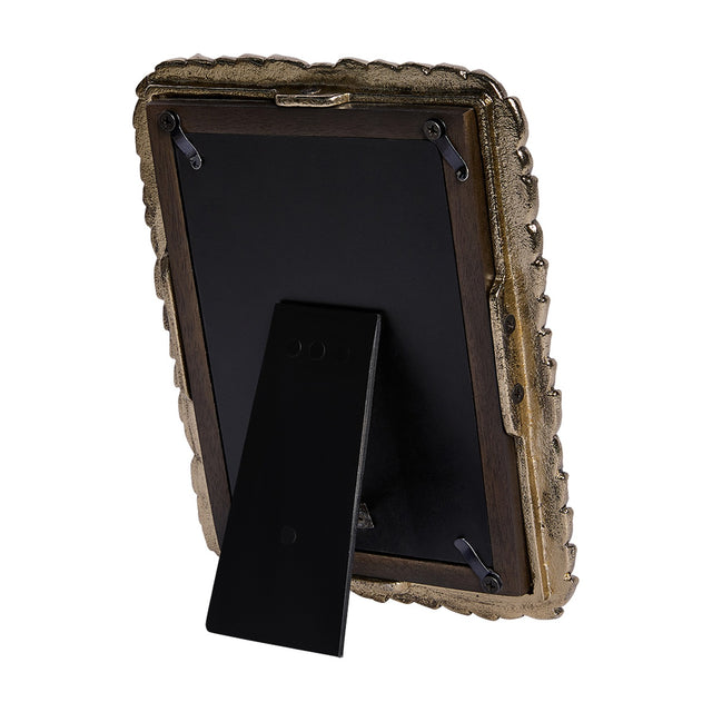 Rear view of the Libra Interiors Antiqued Gold Leaf 4x6 photo frame showing wooden backing, black panel and fold-out stand on a white background.