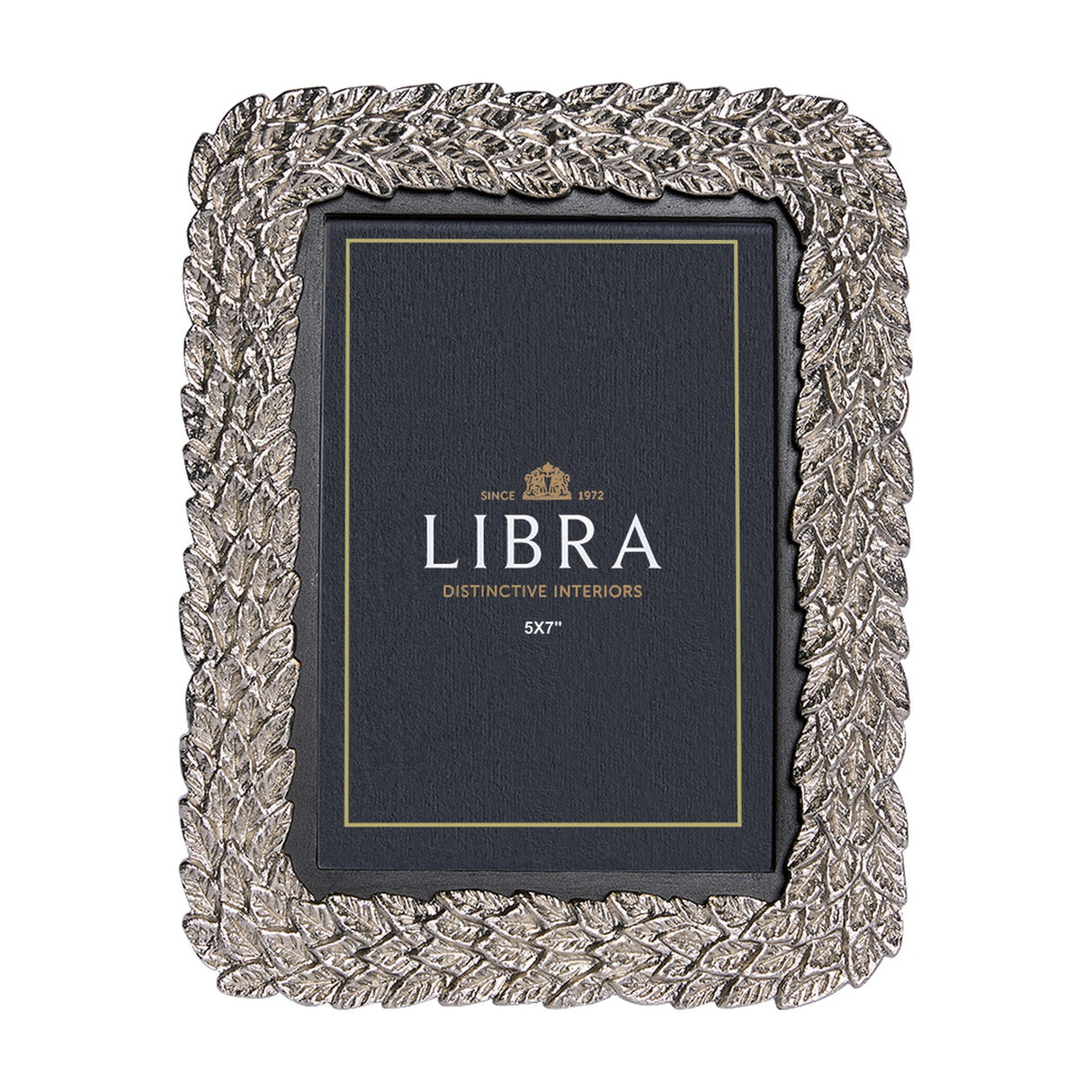 Libra Interiors Antiqued Leaf aluminium 5x7 photo frame in silver, with a raised botanical leaf border and wooden inner frame, shown in portrait orientation.