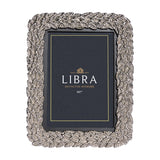 Libra Interiors Antiqued Leaf aluminium photo frame in silver, portrait orientation with sculpted leaf border around a dark inner panel, on a white background.