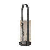 Libra Interiors Hammered Glass Arched Handle Hurricane Lantern in brown, with a copper-toned textured glass cylinder and corrugated iron arched handle.