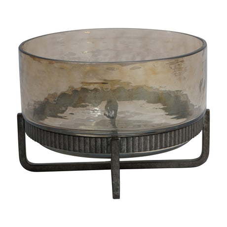 Libra Interiors Hammered Glass & Iron Cake Stand in bronze, featuring a smoked textured glass bowl on a ribbed antique bronze iron base with angular legs.