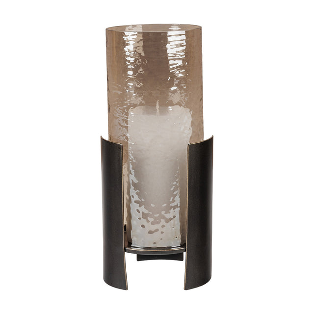 Libra Interiors Ribbed Glass Bronzed Iron Hurricane Lantern in brown, featuring a tall copper-toned cylindrical shade held within curved dark iron uprights.