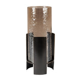Libra Interiors Ribbed Glass Bronzed Iron Hurricane Lantern in brown, with a tall cylindrical shade set within a curved matte black iron frame.