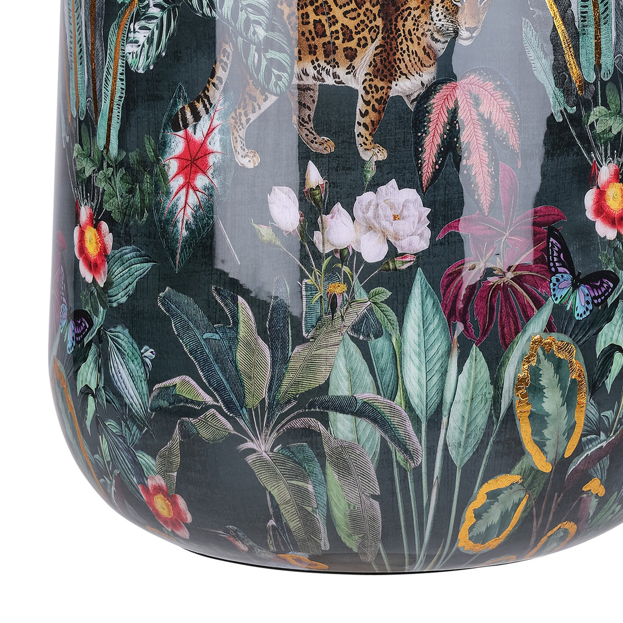 Close-up of Libra Interiors Enamel Iron Tropical Vase showing glossy print of leopard, foliage, pink and white florals, and butterflies on deep green.