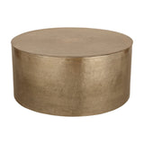 Libra Interiors Drum Storage Coffee Table in champagne gold aluminium with a round drum shape and pitted, textured finish, on a plain white background.