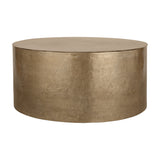Libra Interiors Drum Storage Coffee Table in champagne gold aluminium with a pitted, textured finish and lift-off lid, shown on a white background.