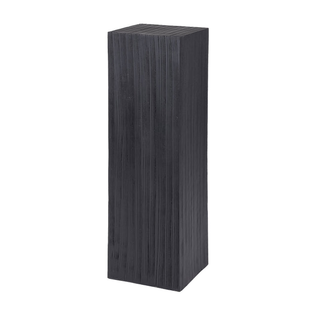 Libra Interiors Grooved Wood Black Display Plinth in solid mango wood with a matt black stain and vertical carved grain, shown on a plain white background.
