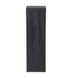 Libra Interiors Grooved Wood Black Display Plinth in solid mango wood with vertical carved grain and matt black finish, shown on a plain background.