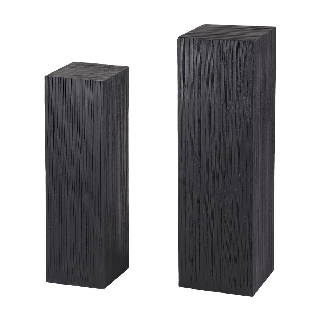 Libra Interiors Grooved Wood Black Display Plinths in matt black mango wood with vertical carving, shown as a tall and shorter pair on white.