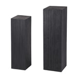 Libra Interiors Grooved Wood Black Display Plinths in matt black mango wood with vertical carving, shown as a tall and shorter pair on white.