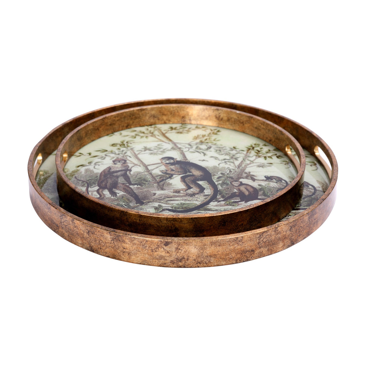 Libra Interiors Round Glass Monkey Jungle serving tray set of two in antiqued gold with cream botanical print and inset handles, nested on white.
