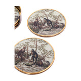 Libra Interiors Jungle Monkey round coasters in cream with vintage monkey and foliage print, gold-effect trim, shown with matching antiqued holder.