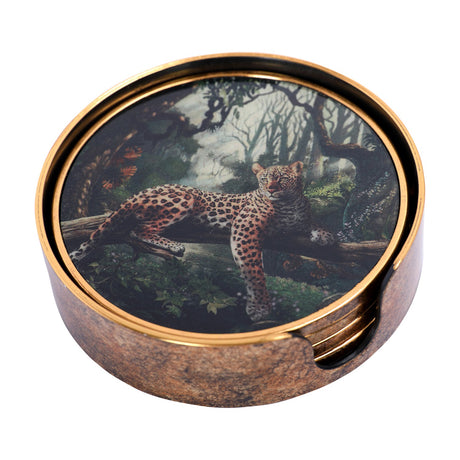 Libra Interiors Jungle Print round acrylic coaster set in a matching holder, showing a leopard on a branch illustration framed by an antiqued gold rim.