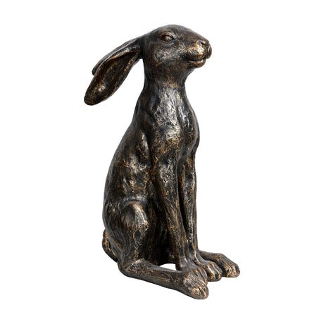Libra Interiors Antique Bronze Sitting Hare Sculpture in textured resin, shown upright with elongated ears and turned head on a plain white background.