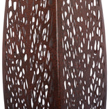 Close-up of Libra Interiors Solar Cut-Out Iron Leaf Sculpture showing the pierced organic cut-out pattern across the warm bronze rust iron surface.
