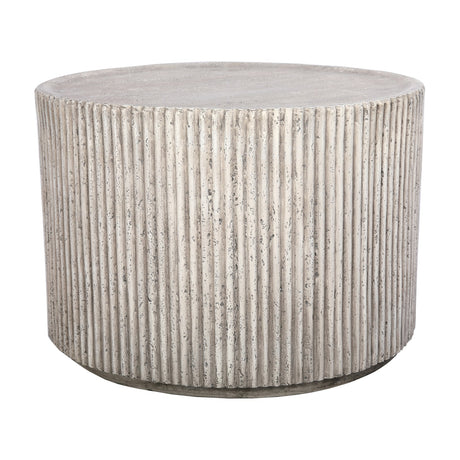 Libra Interiors Fluted Round Coffee Table in grey, a cylindrical composite drum with vertical ribbing and weathered stone effect finish, on a white background.