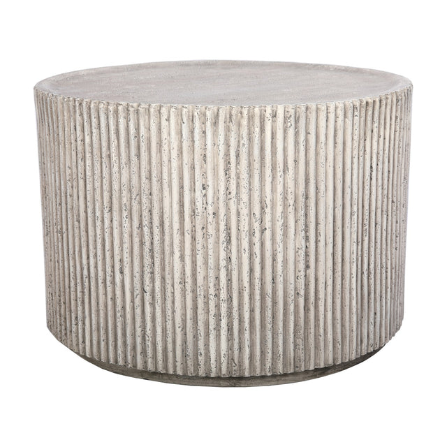 Libra Interiors Fluted Round Coffee Table in grey, a cylindrical composite drum with vertical ribbing and weathered stone effect finish, on a white background.