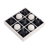 Libra Interiors Bone and Horn Inlay Noughts and Crosses Game with a white bone tray holding off-white bone balls and black horn crosses on a white background.