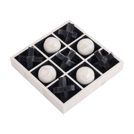 Libra Interiors Bone and Horn Inlay Noughts and Crosses Game with a white bone tray holding off-white bone balls and black horn crosses on a white background.