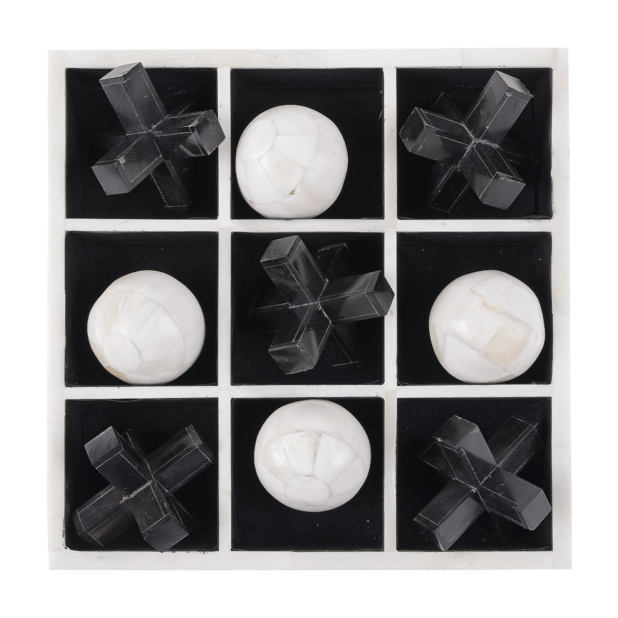 Libra Interiors Bone and Horn Inlay Noughts and Crosses Game shown from above with four white bone balls and five black horn crosses in a nine-square tray.