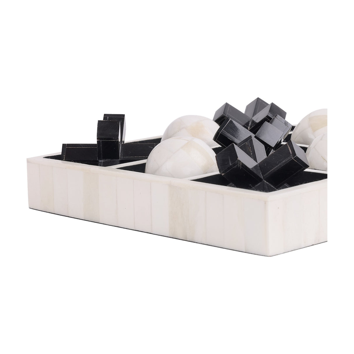 Libra Interiors Bone and Horn Inlay Noughts and Crosses Game shown close-up with off-white bone balls and black horn crosses in a bone inlay tray.