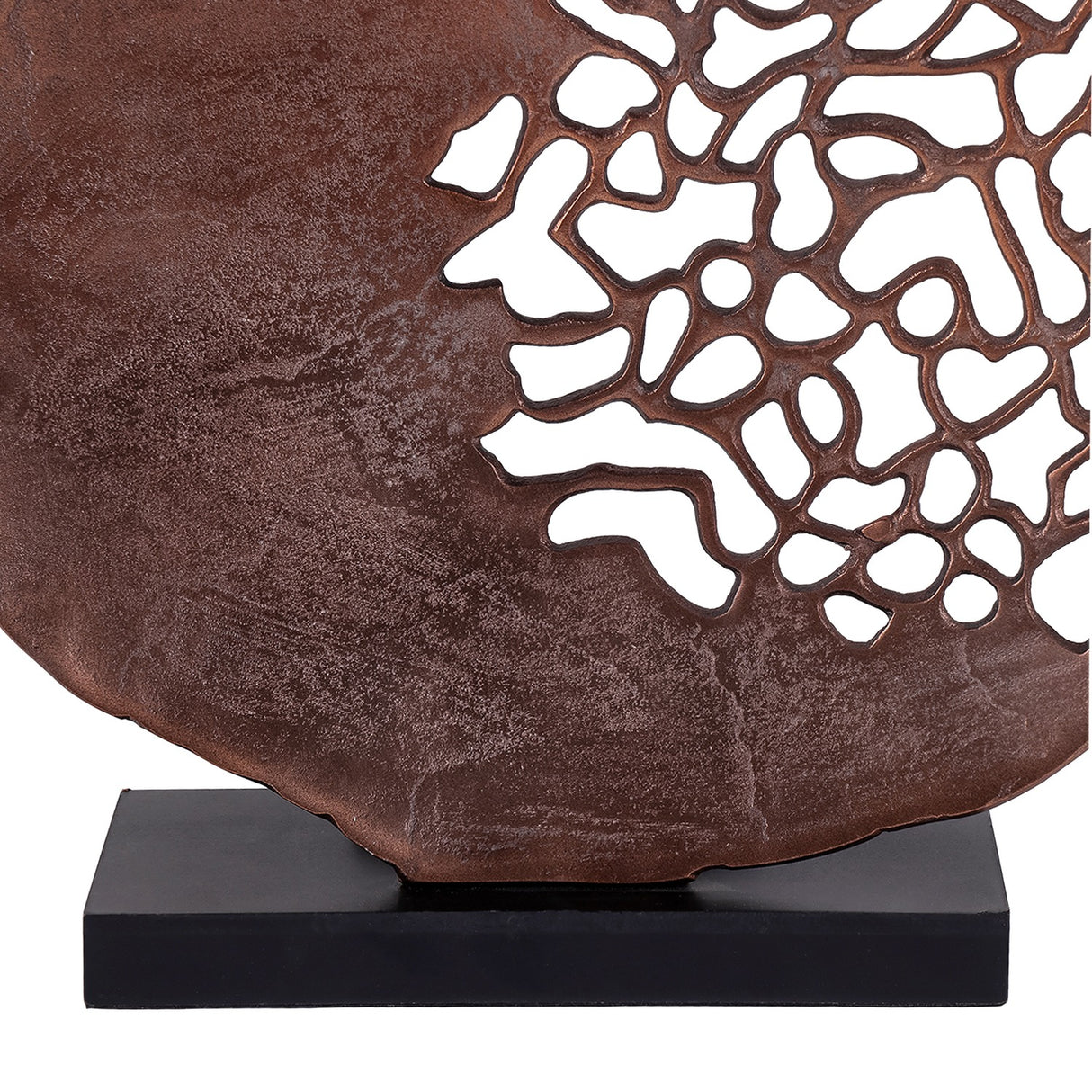 Close-up of the Libra Interiors Coral Cut-Out Round Aluminium Sculpture in bronze, showing the textured disc, latticework edge and black rectangular base.
