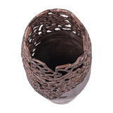 Top-down view of Libra Interiors Coral Cut-Out floor vase in raw bronze aluminium, showing the pierced coral lattice rim and hollow interior.