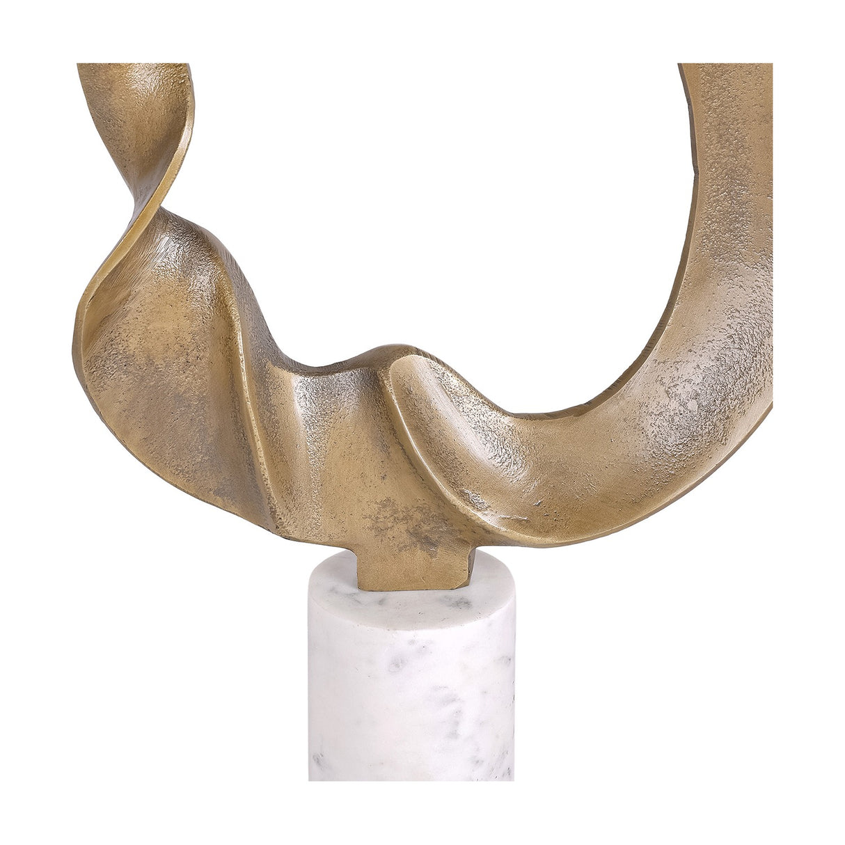 Close-up of Libra Interiors Abstract Aluminium Ring Sculpture in gold, showing the twisted antique gold looping form meeting the white marble cylindrical base.
