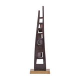 Libra Interiors tall geometric cut-out aluminium sculpture in blackened bronze with tapered asymmetric uprights and brass-toned base, on a white background.