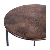 Close-up of the Libra Interiors Radial Etched Round Nesting Side Table in bronze, showing the cast aluminium top's radial etched pattern and matt black frame.
