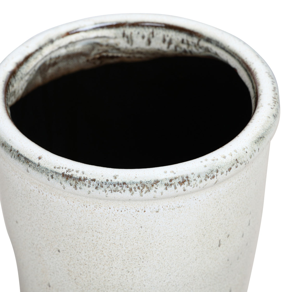 Close-up of the Libra Interiors Speckled Glazed Tall Ceramic Planter in white, showing the rolled lip and darker speckled glazed rim above the smooth body.