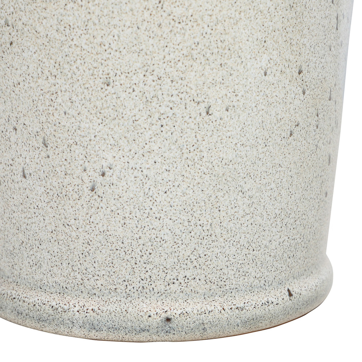 Close-up of the Libra Interiors Speckled Glazed Tall Ceramic Planter in white, showing the mottled hand-glazed surface and neat foot at the base.