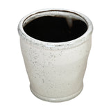 Libra Interiors Speckled Glazed Ceramic Planter in white with a tapered rounded shape, subtle speckling and a darker glazed rim, on a plain background.